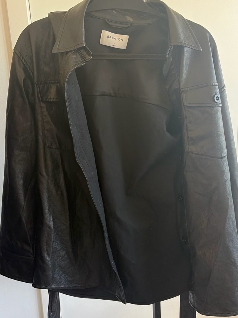 Aritzia Black polyuerthane jacket from Babaton